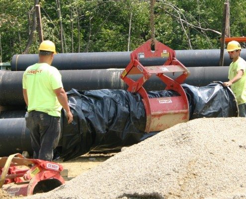 Wright Using Pipe Lift on Wrapped Pipe