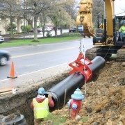 Thomas Construction Setting Pipe with the Kenco Pipe Lift