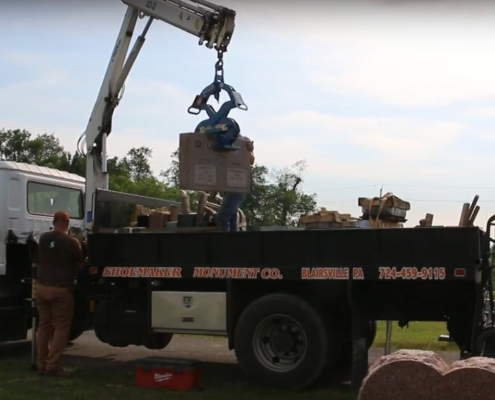 Unloading Tombstone from Truck