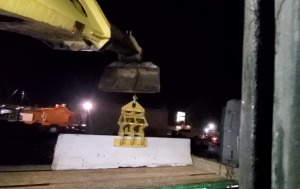 setting barrier on truck