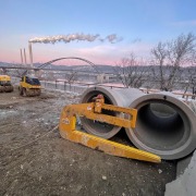 pipe hook near river at sunrise