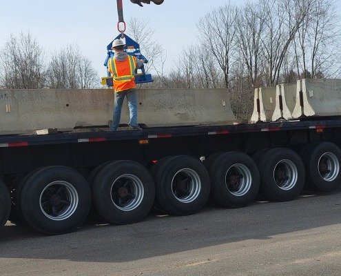 J&N Company unloads jersey wall from truck