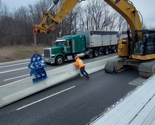 positioning jersey wall on roadway