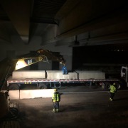kl9000v4 unloading wall off truck under bridge