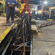 picking metal straps industrial setting