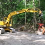 non hydraulic tong to pick up big boulders being used on excavator