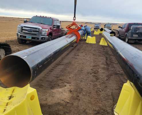 how to hold pipeline to weld segments together safely