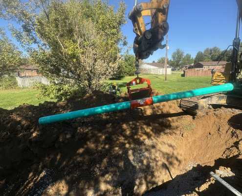 easiest method for installing pipe in trench with excavator