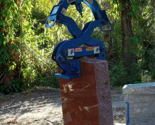 how to unload a monument or headstone from delivery pallet with clamping device