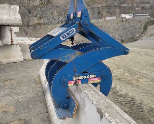 blue k rail grabbing device close up